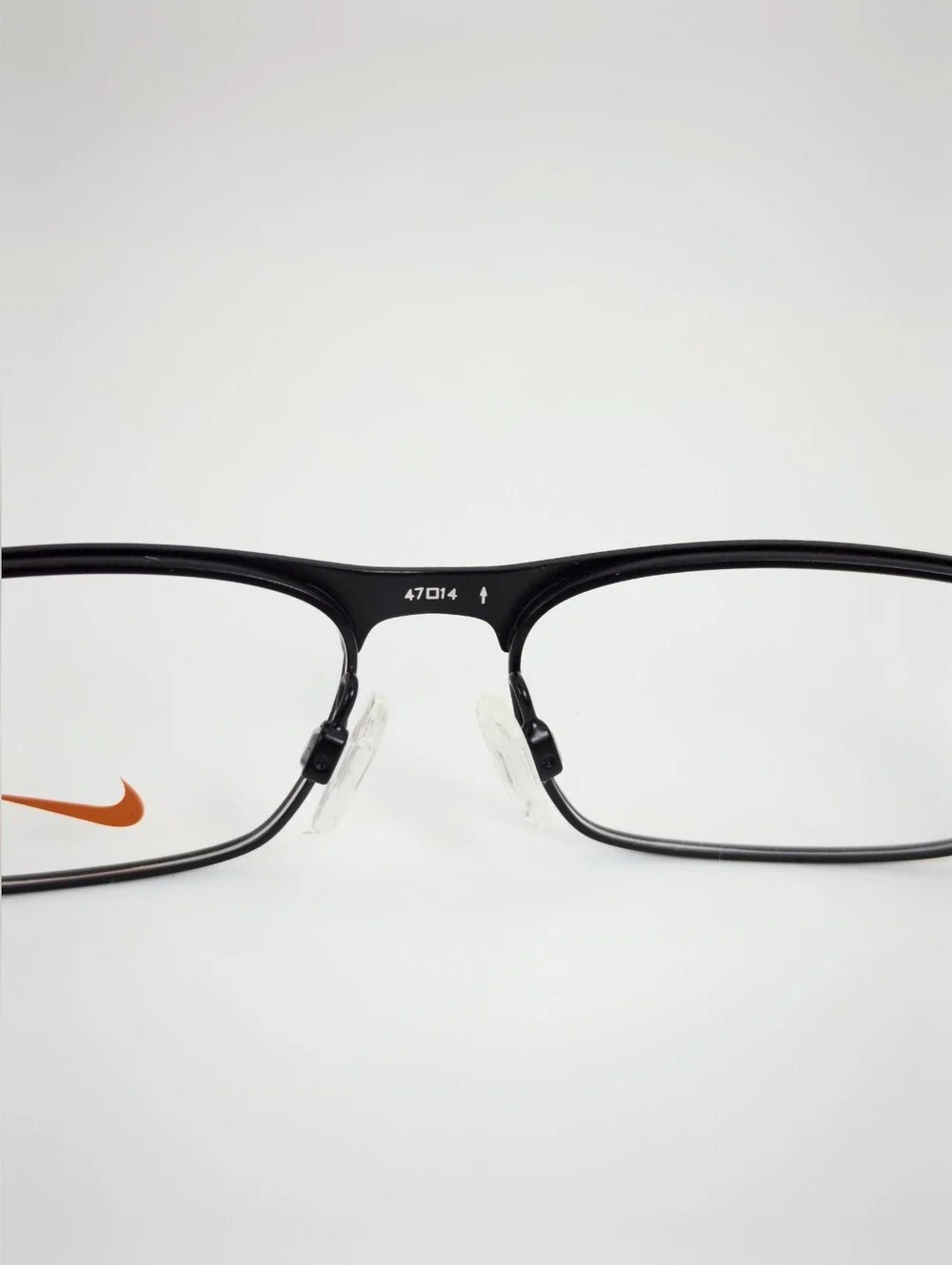 Nike Youth. Black metal front, Royal Blue Temples With Lime Green Swoosh.